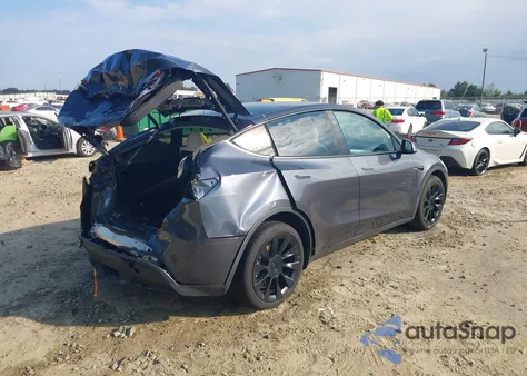 2023 Tesla Model Y Awd/Long Range Dual Motor All-Wheel Drive z USA, uszkodzony, nr VIN 7SAYGDEE4PA167984
